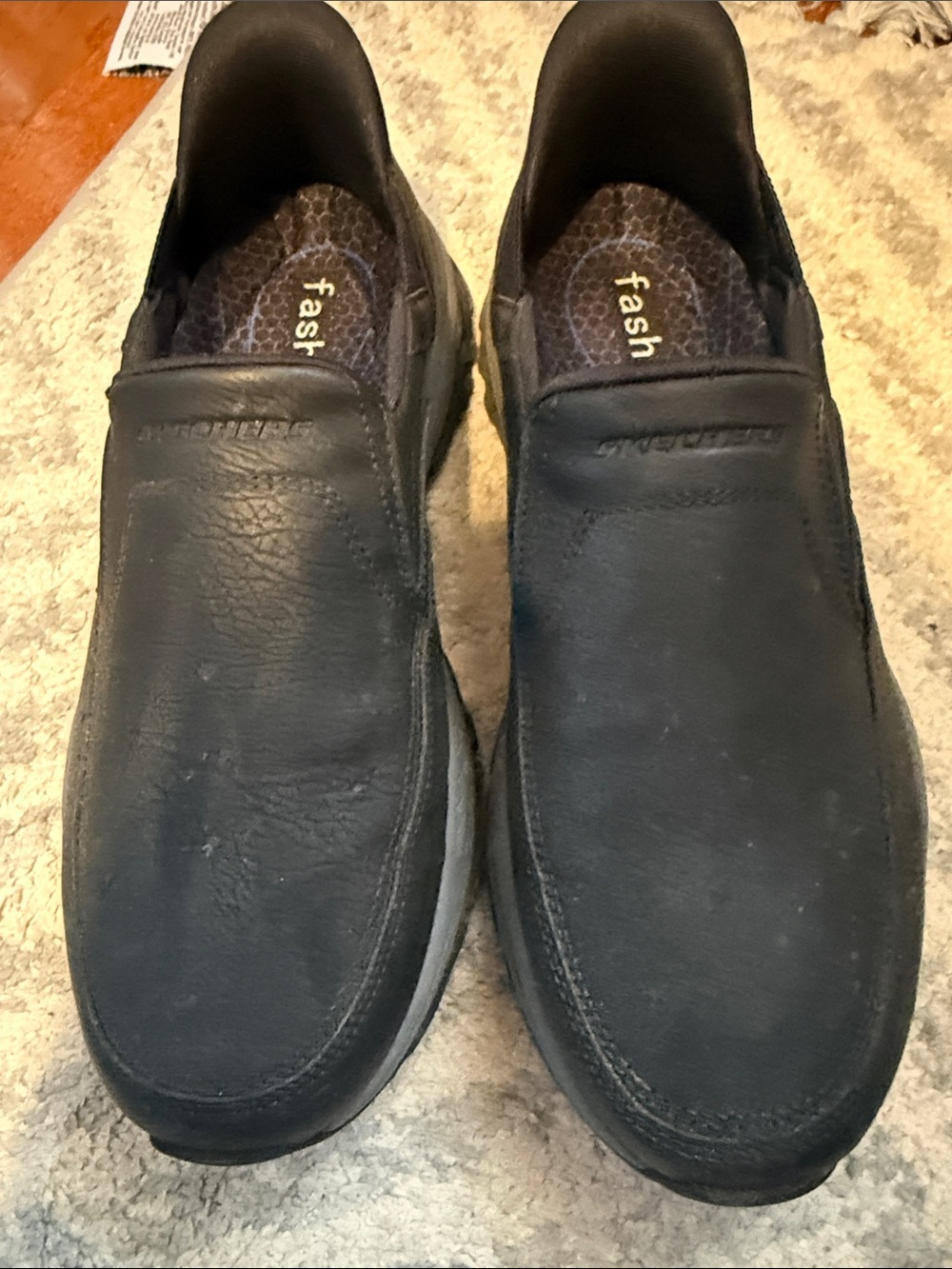 Sketchers black slip on loafers